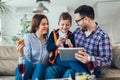 Family doing online shopping with tablet Royalty Free Stock Photo