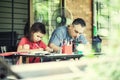 The family draws on the terrace in the summer