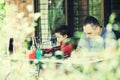 The family draws on the terrace in the summer