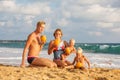 Family drink cocnut at the beach at sunset Royalty Free Stock Photo