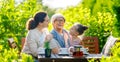 family drinking tea in the garden Royalty Free Stock Photo