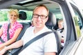 Family driving in car Royalty Free Stock Photo