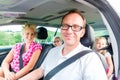 Family driving in car with seat belt Royalty Free Stock Photo