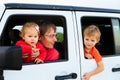 Family driving off-road car on tropical beach Royalty Free Stock Photo