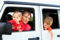 Family driving off-road car on tropical beach Royalty Free Stock Photo