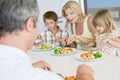 Family Eating A meal,mealtime Together Royalty Free Stock Photo