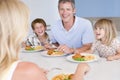 Family Eating A meal,mealtime Together Royalty Free Stock Photo