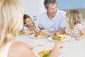 Family Eating A meal, mealtime Together Royalty Free Stock Photo