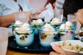 Family eating with ordered seven servings of the popular and favorite Filipino cold dessert Halo-halo also spelled haluhalo Royalty Free Stock Photo