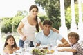 Family eating outisde together Royalty Free Stock Photo
