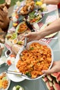 Family eating outside together in summer Royalty Free Stock Photo