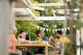 Family eating outside together in summer Royalty Free Stock Photo