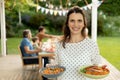 Family eating outside together in summer Royalty Free Stock Photo