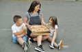 Family eating pizza outdoors. Street food concept. Royalty Free Stock Photo