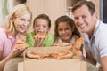 Family Eating Pizza Together Royalty Free Stock Photo