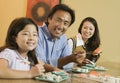 Family Eating Sushi Together Royalty Free Stock Photo