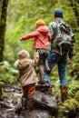 A family engaged in outdoor activities with a focus on presence. Moments in nature