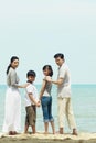 Family enjoying the beautiful view on the beach. Conceptual image Royalty Free Stock Photo