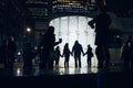 A family at Winter Lights Festivan in Canary Wharf, London, 2019.