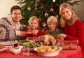 Family Enjoying Christmas Meal At Home