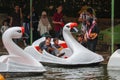 family enjoying a duck boat ride at a lake tourist spot Royalty Free Stock Photo