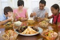 Family Enjoying meal, mealtime Together Royalty Free Stock Photo