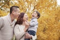 Family Enjoying a Park in Autumn