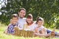 Family Enjoying Summer Picnic In Countryside Royalty Free Stock Photo