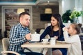 Family Enjoying tea In Cafe Together Royalty Free Stock Photo