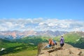 Family enjoying time together on on top of the mountain. Royalty Free Stock Photo