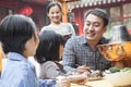 Family enjoying a traditional Chinese meal Royalty Free Stock Photo