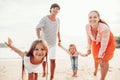 Family on the evening beach Royalty Free Stock Photo