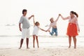 Family on the evening beach Royalty Free Stock Photo