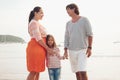 Family on the evening beach Royalty Free Stock Photo