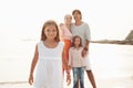 Family on the evening beach Royalty Free Stock Photo