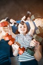 Family exercising with dumbbells at fitness studio, dumbbells in heart shape Royalty Free Stock Photo