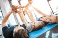 Family exercising with dumbbells at fitness studio, dumbbells in heart shape Royalty Free Stock Photo