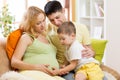 Family expecting new baby. Little boy touching Royalty Free Stock Photo