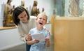 Family exploring artworks in museum
