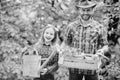 Family farm. spring village country. ecology. Watering can and shovel. little girl and happy man dad. earth day. father Royalty Free Stock Photo