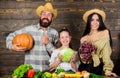 Family farmers with harvest wooden background. Family rustic style farmers market with fall harvest. Harvest festival Royalty Free Stock Photo