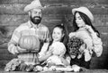 Family farmers with harvest wooden background. Family rustic style farmers at market with vegetables fruits and greenery Royalty Free Stock Photo