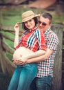 Family of farmers waiting baby Royalty Free Stock Photo