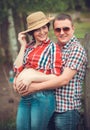 Family of farmers waiting baby Royalty Free Stock Photo