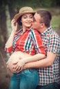 Family of farmers waiting baby Royalty Free Stock Photo