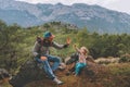 Family father and child daughter high five hands traveling in mountains Royalty Free Stock Photo