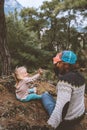 Family father and child daughter high five hands weekend in forest Royalty Free Stock Photo