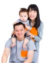 Family with father giving piggyback with baby son Royalty Free Stock Photo