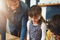 Family, father and kids baking in kitchen, bonding and preparation for lunch in home. Dad, children and cooking together Royalty Free Stock Photo