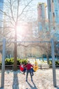 Family of father and kids in Central Park have fun on american vacation in New York City